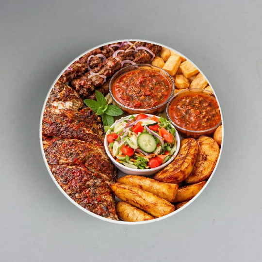 Suya Sticks with Fried Yam, Grilled Plantain & Pepper Sauce